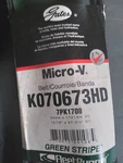 New Gates K070673HD Green Stripe Heavy Duty Serpentine Belt 15/16" X 67-3/4". Fixed Price $33.00.