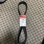 Genuine Ford V-belt JK8-996-AA. Fixed Price $56.95.