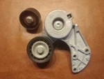 Gates 38317 Belt Tensioner And 36384 Idler Pulley. Fixed Price $90.00.