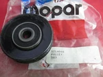 Idler Pulley Nos Mopar Dodge Plymouth 5214066. Fixed Price $69.95.